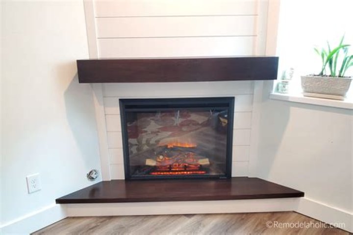 How do you make a corner fireplace look modern?